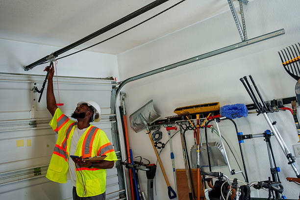 Professional Garage Door Panel Replacement technician working in Clarksville, AR